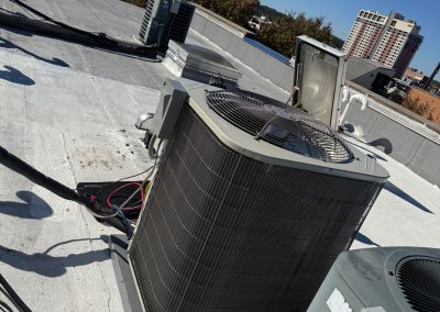 Central air conditioning units on a flat roof.